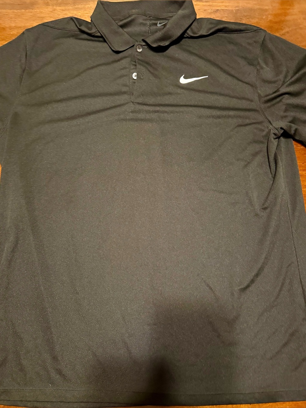 Nike Black Polo Shirt with White Swoosh